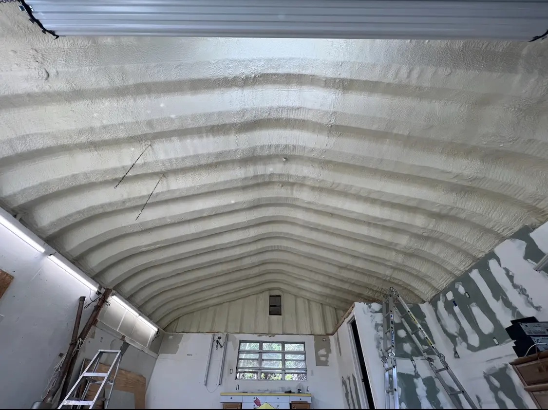 Spray polyurethane foam applied to the underside of a metal roof deck in Chaska